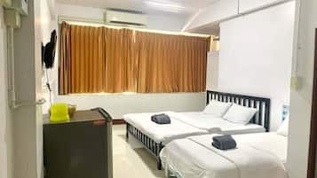 Triple Room, City View | Free minibar items, blackout drapes, free WiFi