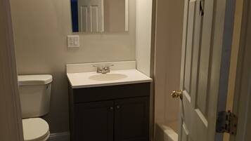 Hair dryer, towels, soap, toilet paper