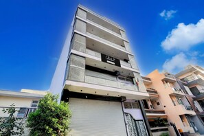 A multi-story building with a sign reading 'Collection.' - Deluxe Collection O Sadar Bazaar (Gurugram)