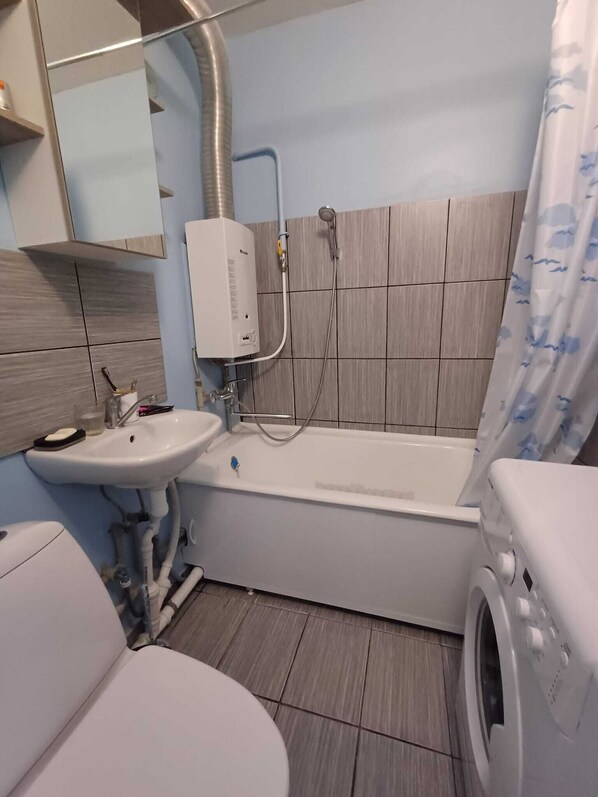 Hair dryer, towels, soap, toilet paper