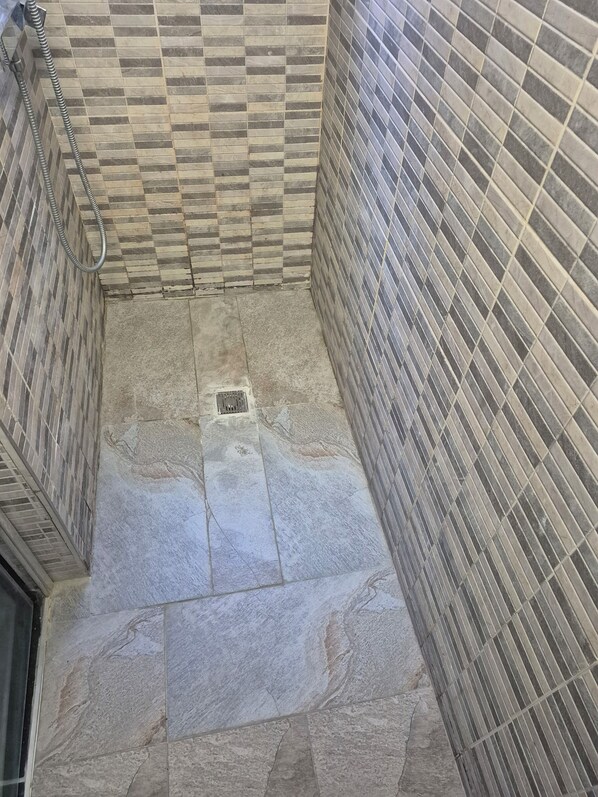 Shower, hair dryer, soap, shampoo