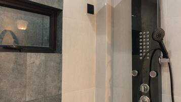 Shower, jetted tub, hair dryer, towels