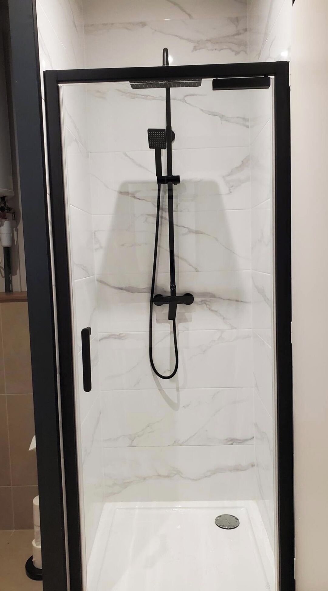 Shower, towels, soap, toilet paper