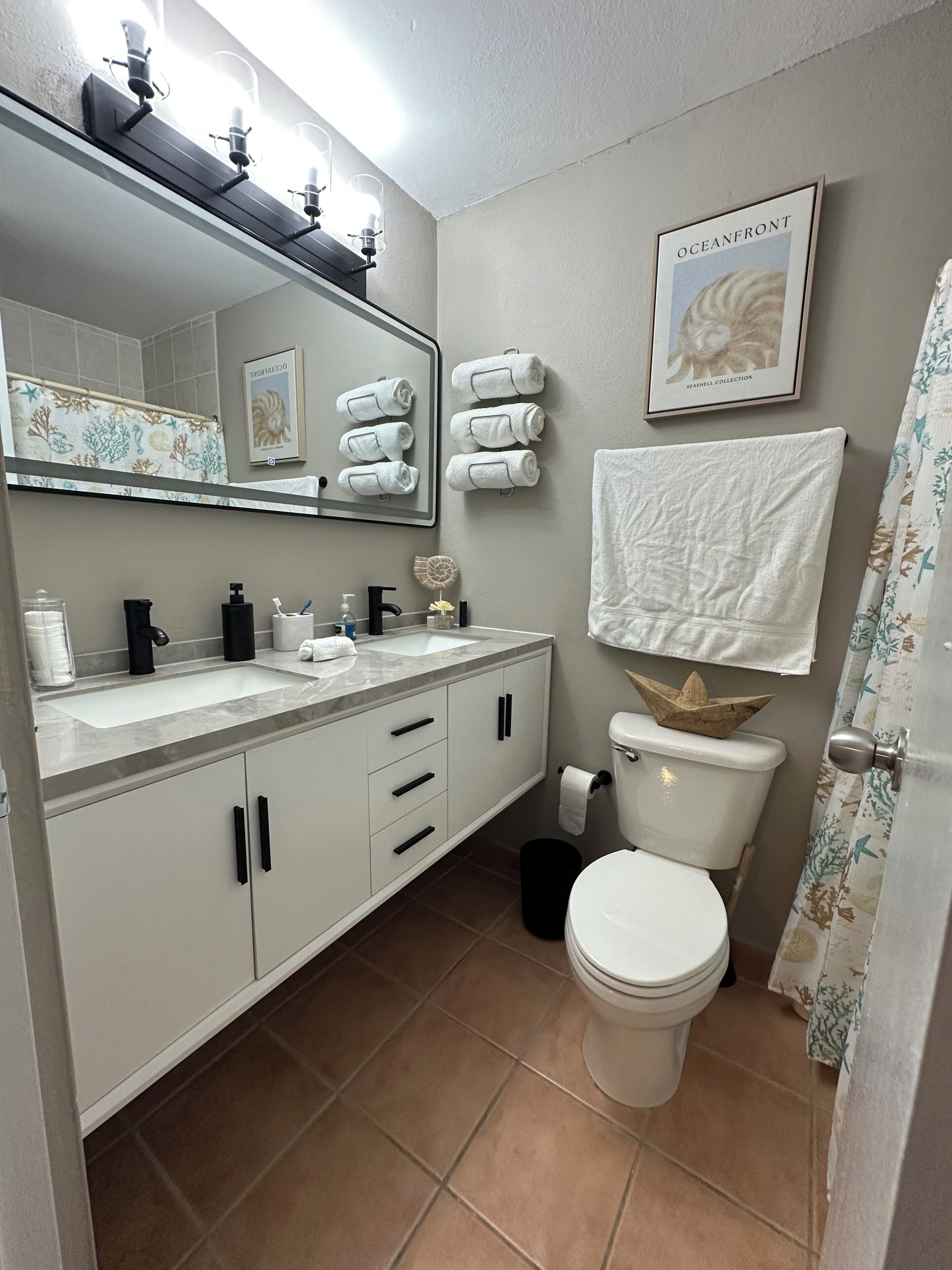 Hair dryer, towels, soap, toilet paper