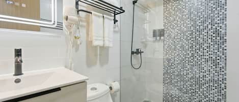 Shower, hair dryer, towels, soap