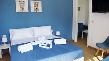 Suite, vista giardino | Una scrivania, Wi-Fi gratuito