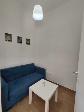 Suite, vista giardino | Area soggiorno