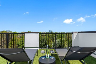 Modern Luxe City Retreat • Private Rooftop Oasis • Garage • Ideally Located