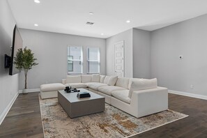 Living area - Modern Luxe City Retreat • Private Rooftop Oasis • Garage • Ideally Located (Tampa)