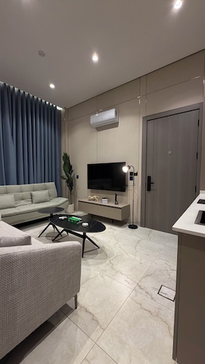 Apartamento, 2 quartos, acessível, para fumantes | Sala de estar