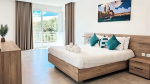 A modern bedroom with a wooden bed, a nightstand, a desk, and a balcony with curtains.