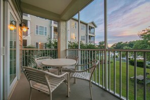 Outdoor dining - Minutes to SkyWheel: 2 1BR Villas w/ Waterpark, Arcade & Free On-site Parking (Myrtle Beach)