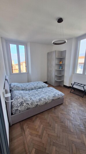 2 habitaciones, wifi gratis y ropa de cama 