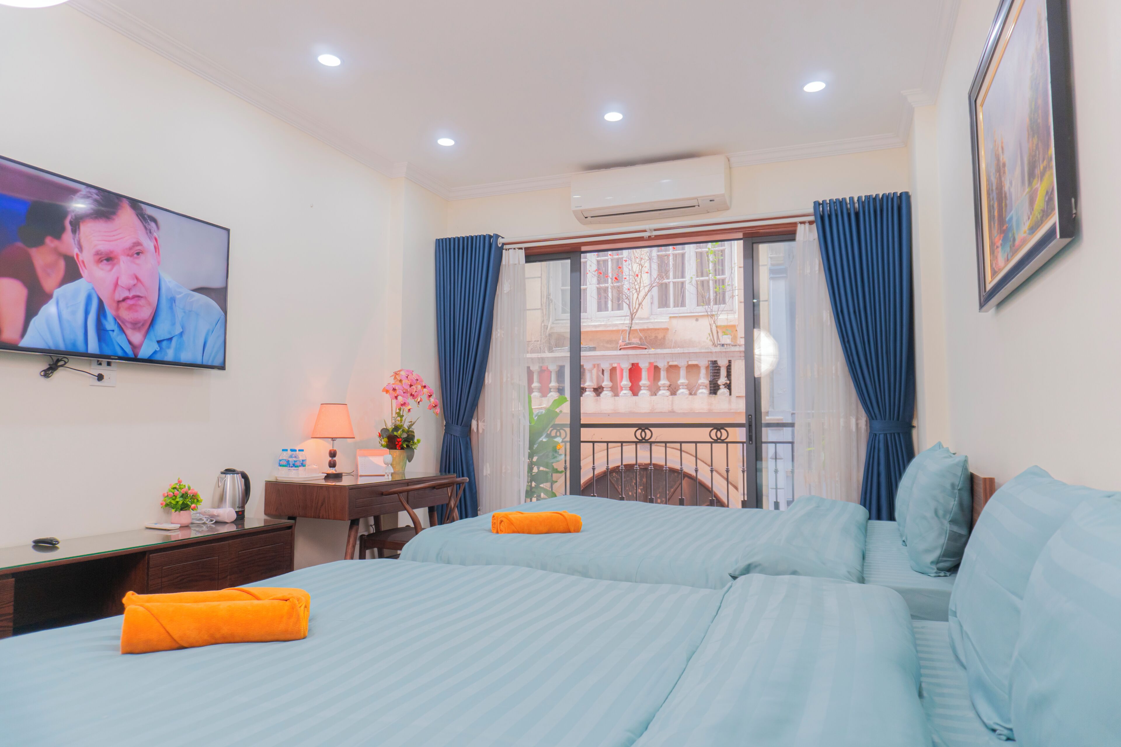 Familie vierpersoonskamer, uitzicht op stad