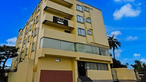 A multi-story building with a sign that reads 'Collection.' - Classic With Balcony Mourigram Near Andul Road (Howrah)