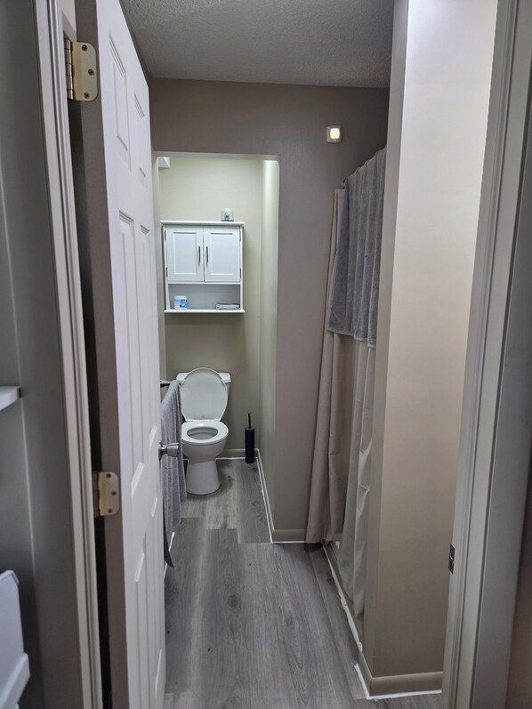Shower, towels, soap, toilet paper