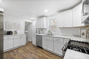 Private kitchen - Coastal Comfort - Retreat w/ Sauna, Hot Tub & Games near Indiana Dunes (Michigan City)