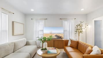 Smart TV, fireplace, table tennis, books