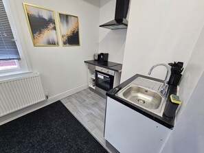 Estudi en suite Deluxe | Cuina privada