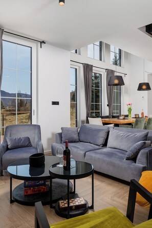 Smart TV, fireplace, table football, books