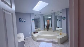 Jetted tub, towels, toilet paper