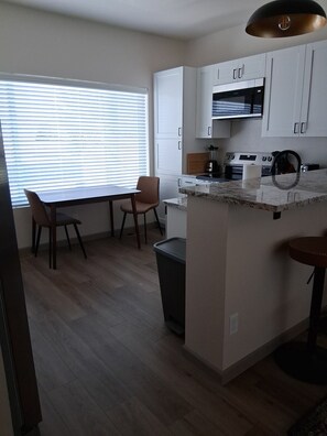 Private kitchen - Modern Spacious Rawlins Apartment w/ Mortal Combat Video Game Console, #3A (Rawlins)