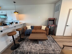 Living area - Modern Spacious Rawlins Apartment w/ Mortal Combat Video Game Console, #3A (Rawlins)