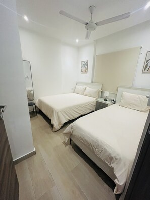 2 dormitorios, tabla de planchar con plancha, wifi gratis y ropa de cama