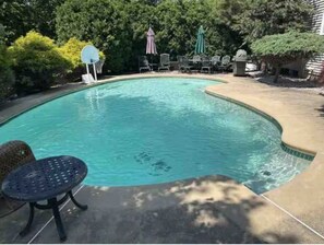 Outdoor pool, a heated pool - Spacious 5-bedroom house in soothing Bethlehem with AC and fitness room (Bethlehem)