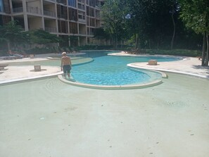 Pool - Brand new charming condo in golf community 24 hour security. (Playa del Carmen)