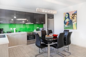 Departamento familiar, vista parcial al mar | Cocina privada