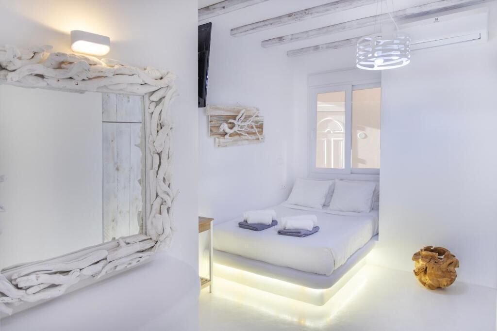 Family Apartment, Balcony, Partial Sea View | Iron/ironing board, free WiFi