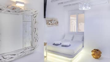 Apartamento família, sacada, vista parcial para o mar | Ferros/tábuas de passar roupa, Wi-Fi de cortesia