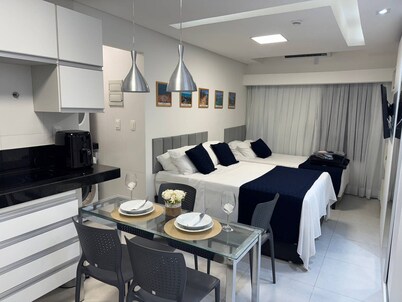 Flat com piscina a 50m da praia