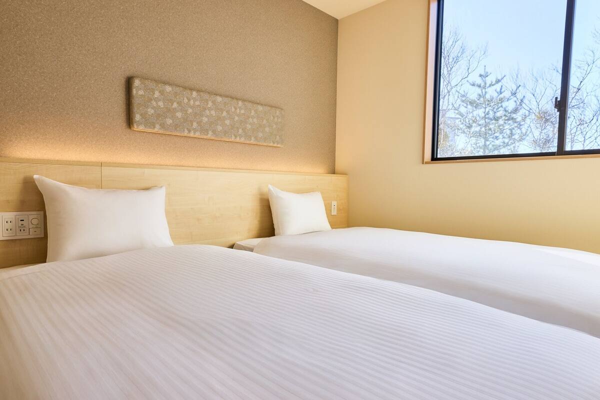 Toetasjes familieleilighet (D,2queen+2single,hotspring bath&sauna) | Wi-fi (inkludert)