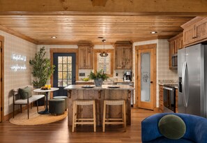 A chef’s kitchen with a mountain soul, where modern design meets warm, natural textures.
 - Twisted Oak: Discover Elevated Wellness • Pool • Sauna • Hot-Tub • Mtn Views (Talking Rock)