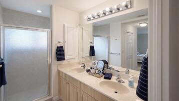 Shower, towels, soap, toilet paper
