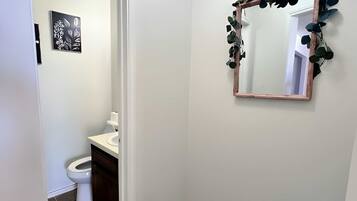 Shower, hair dryer, towels, shampoo