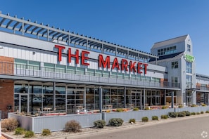 A modern building with a large sign reading 'THE MARKET'.