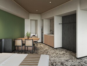 A compact room with a bed, a dining table with chairs, a small kitchen area, and a large wardrobe. - Premium hotel MONday MAIHAMA VIEW II (Tokyo)