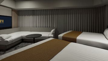 A modern hotel room with a sofa, a single bed, a small table, and a television.