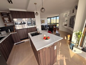 Microwave, oven, stovetop, dishwasher - Penthouse 2 Blocks from the beach with views from the mountains to the ocean (West Vancouver)