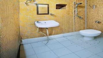 Shower, free toiletries, slippers, towels