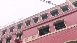 A multi-story building with a sign for 'DEAR HOTEL' on the ground floor. - Dear Hotel (Kolkata)