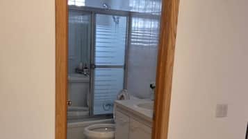 Hair dryer, towels, soap, shampoo