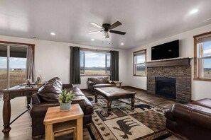 TV, fireplace, table football - Sawtelle Shadow | Sleeps 22, Lake Access, Hot Tub, Yellowstone, Games, & More! (Island Park)