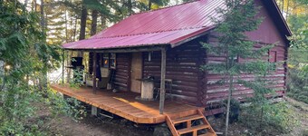 Remote off grid island with log cabin and great fishing, water access only.