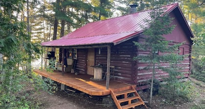 Remote off grid island with log cabin and great fishing, water access only.