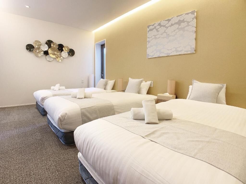 Deluxe Triple Room | Iron/ironing board, free WiFi, bed sheets