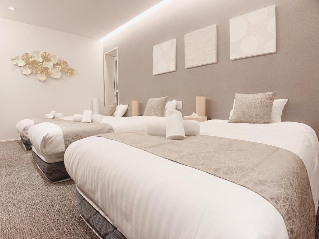 Deluxe Triple Room | Iron/ironing board, free WiFi, bed sheets